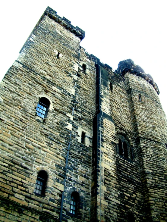 an image of a brick wall with a clock