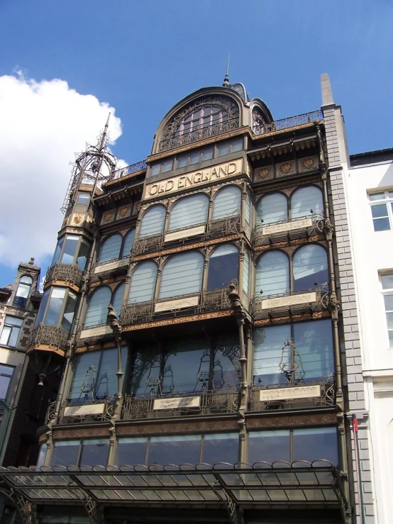 an ornate building is shown against a blue sky