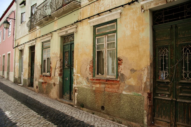 some very old buildings and a brick road