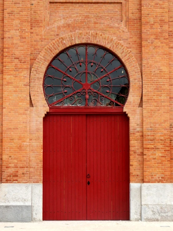 a door and entrance are shown with red bricks