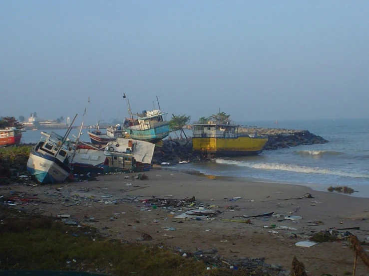 there are many boats that have been washed up