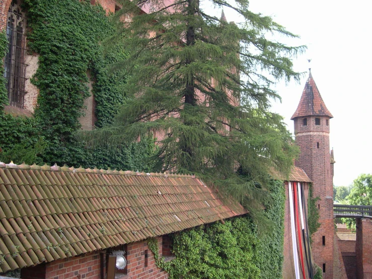 a brick building with a tower and a clock on it