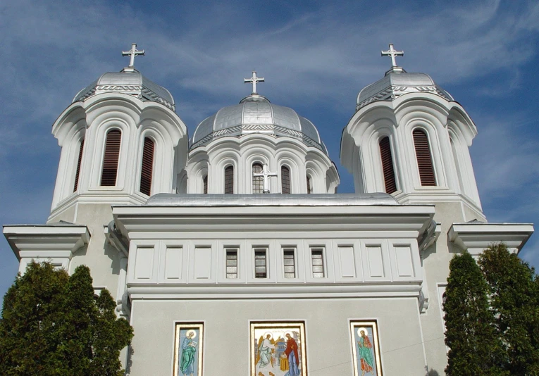 a church with three doors and three cross windows