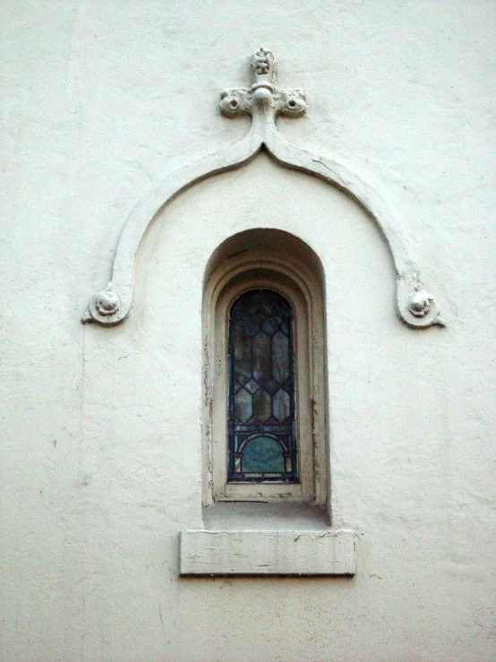 an old window with the top part broken off