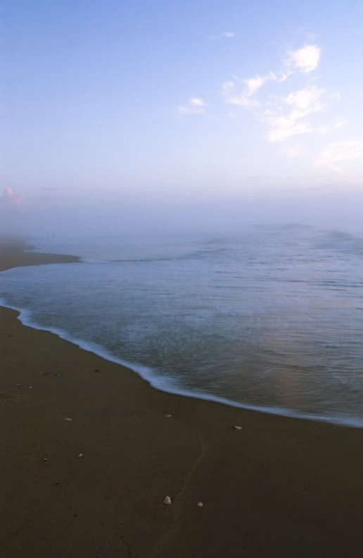 the ocean with the shore lines very empty