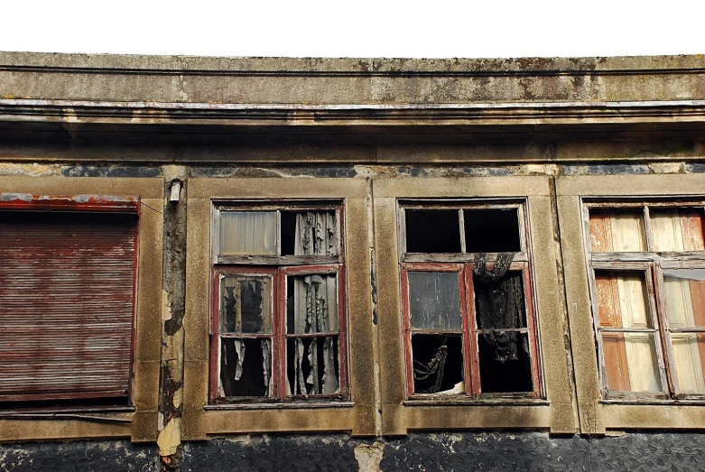 old window with peeling paint in an abandoned building