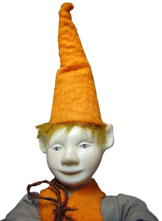 the mannequin head wearing a hat with an orange tassel is the only thing that stands out for this child