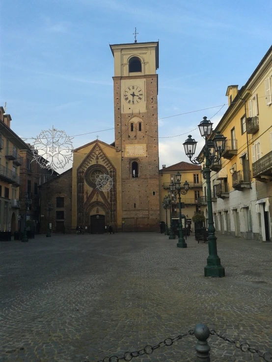 there is a very tall building with a clock at the top