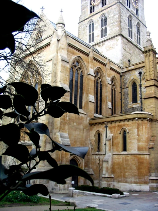 the exterior of a building with an elaborate clock tower