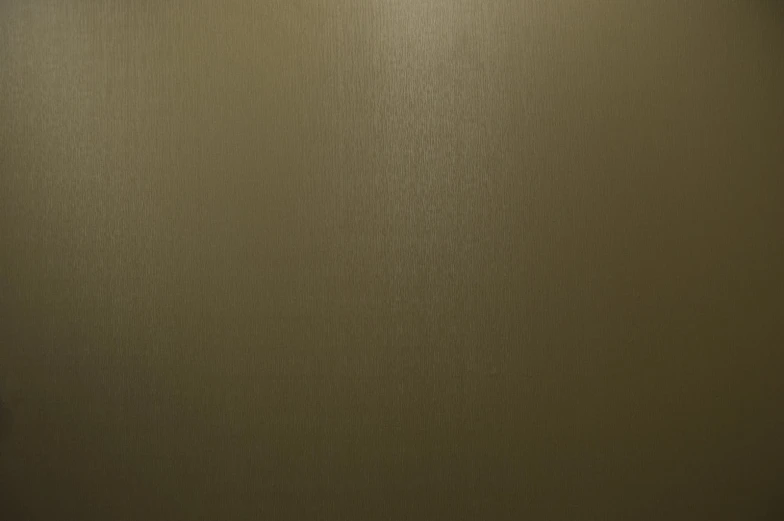 a brown metallic texture wall that has a square shape