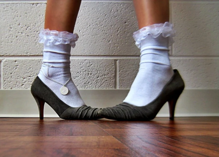 legs and heel of a women wearing high heels