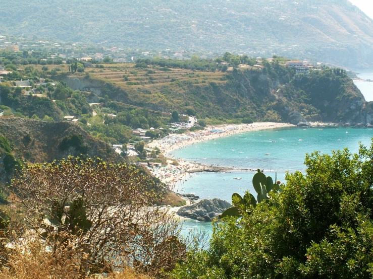 a beautiful beach area with a clear water