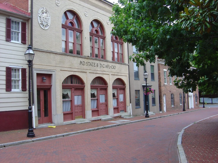 a small town has old buildings and a lamppost