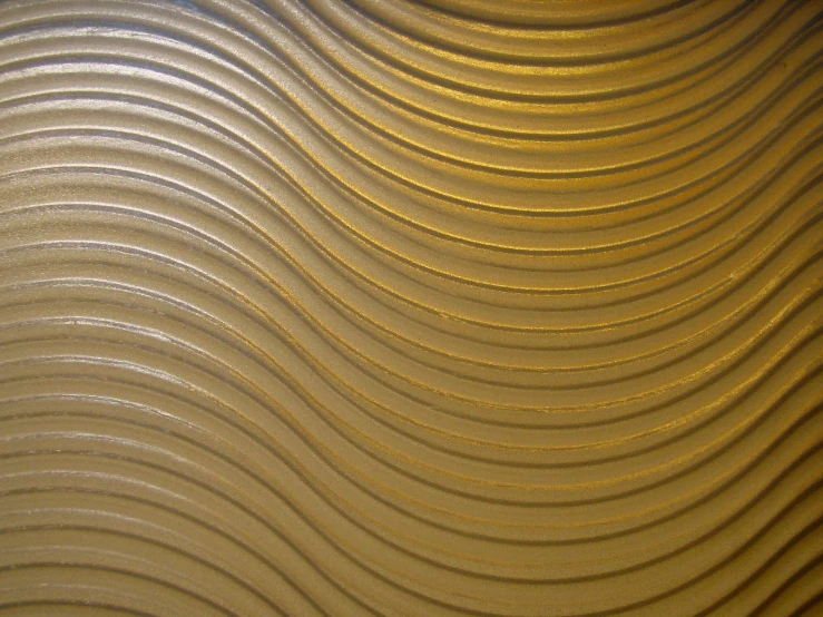 a close up s of wavy design in the sand