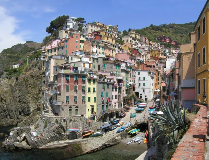 a small village next to the water and a bridge