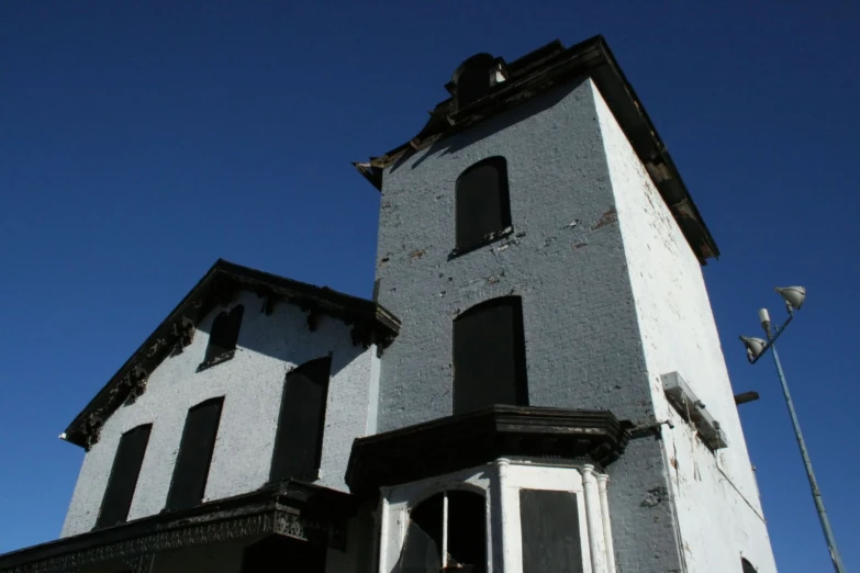 a tower has been built with black shutters