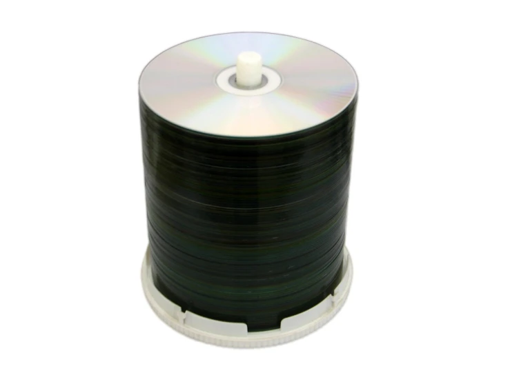 black colored round dvd is placed in the center of a reel