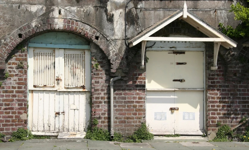 a pair of white doors that have windows on them