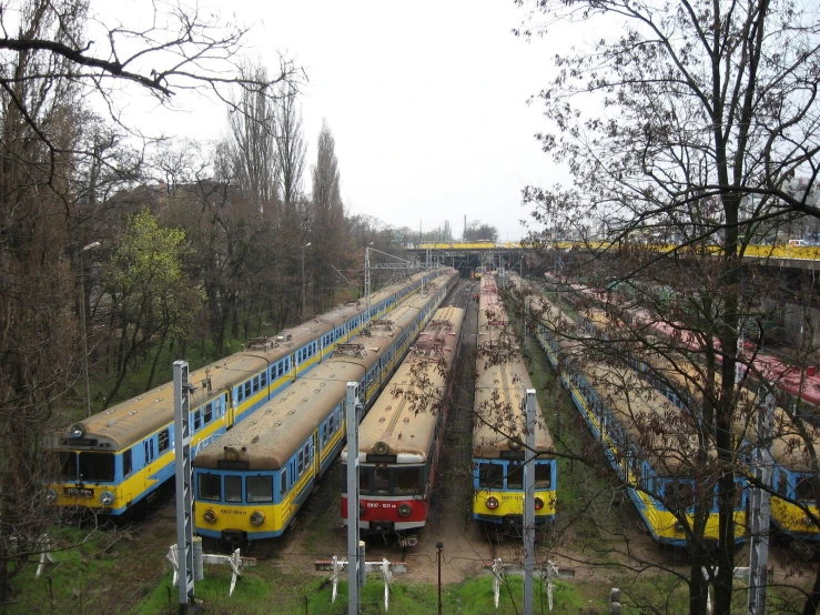 there is a train station with several trains parked