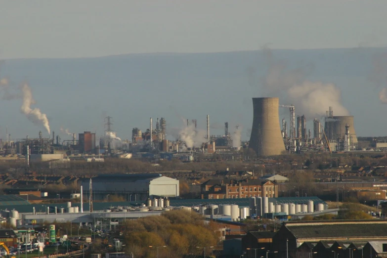 a city with factories, chimneys and a sky