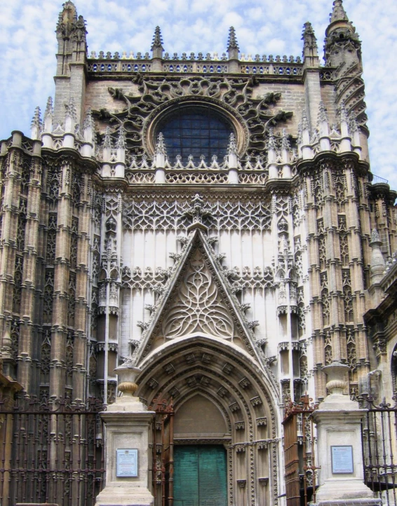 the old church building has elaborate carvings on the front