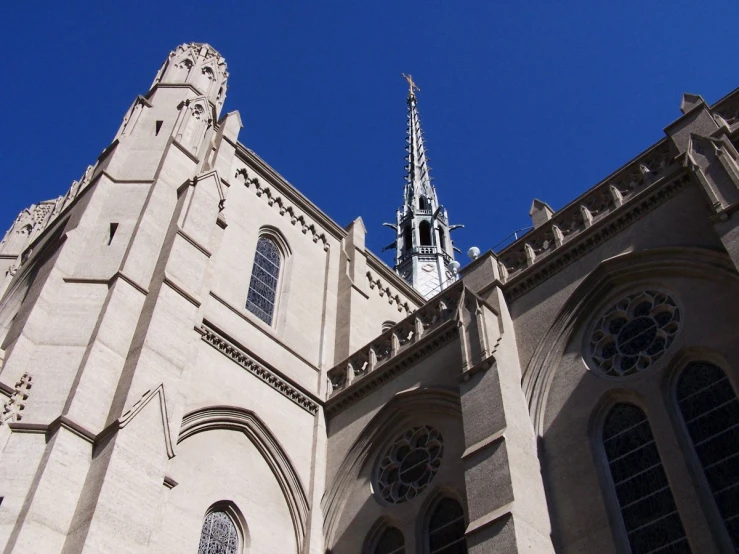 the towers and windows of an old church