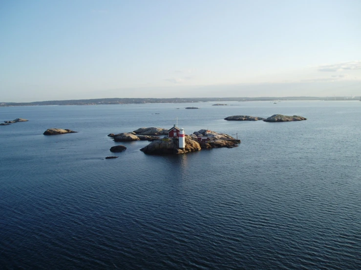 an island that has a lighthouse on it