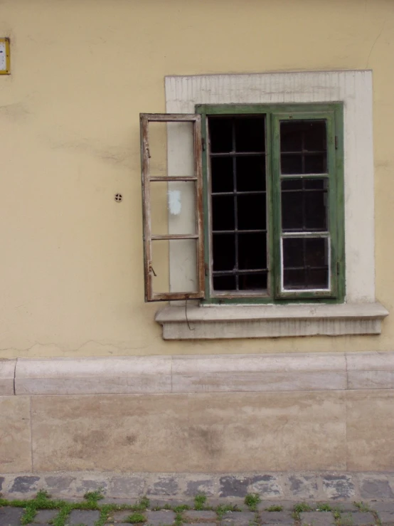 a building with an open window on the outside