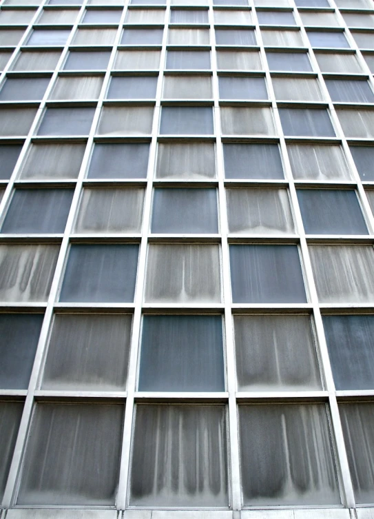 a close up po of a building with rows of windows