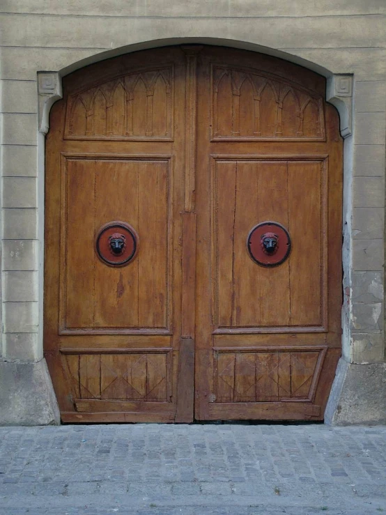 an image of the doors to the building that is in town