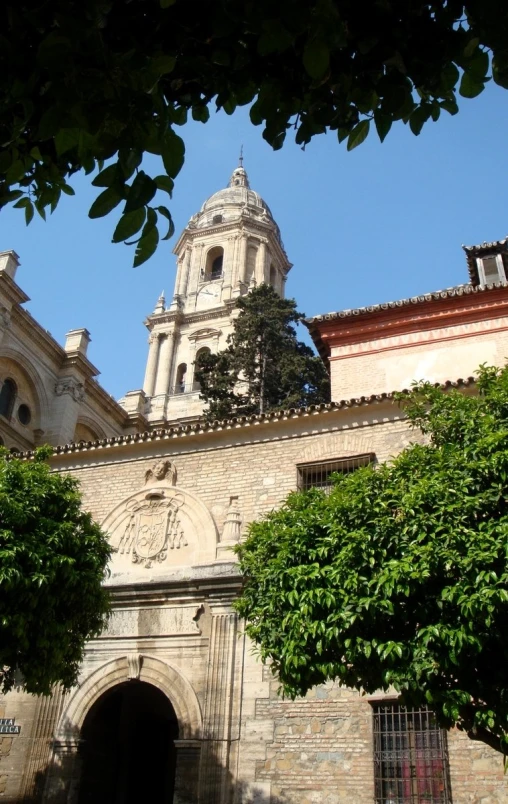 a large building with a clock on it's side