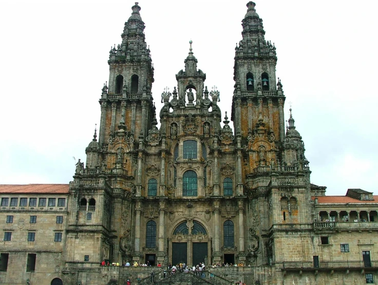 a large church sitting next to a large building