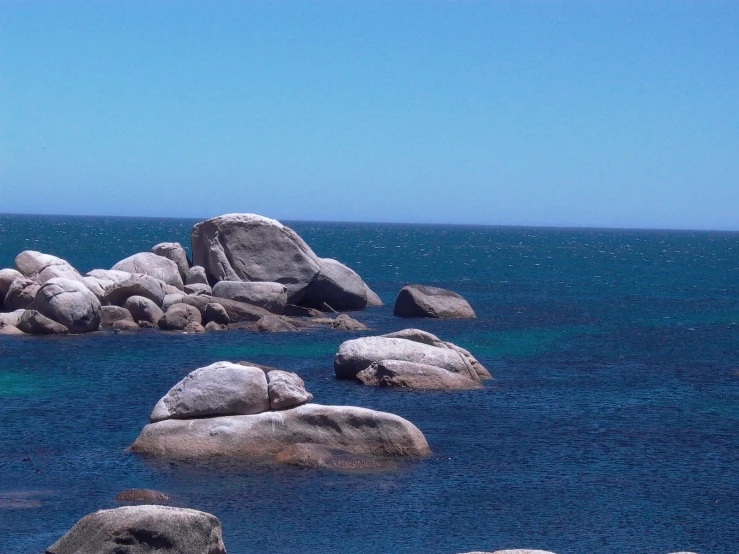 rocks are in the water that surround them