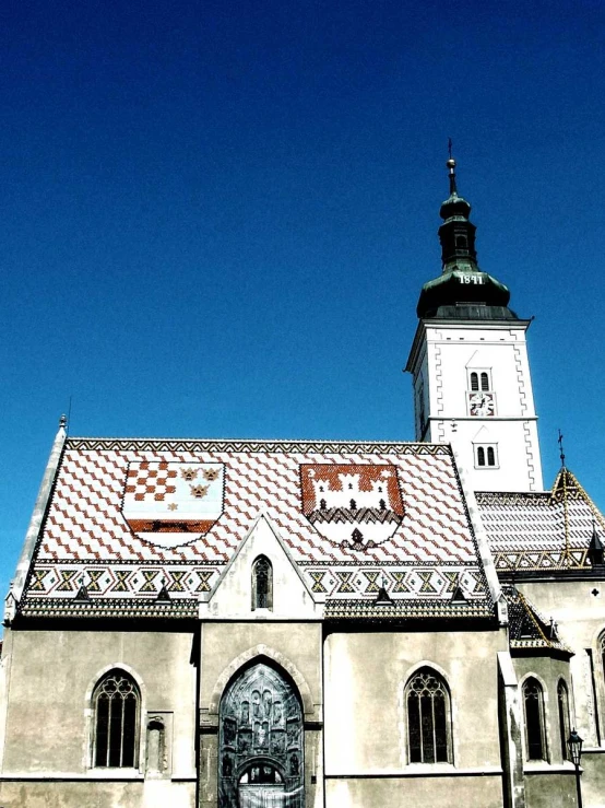 the building has two stories with a clock tower on top