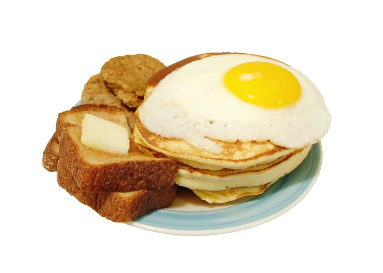 pancakes and fried eggs on a plate