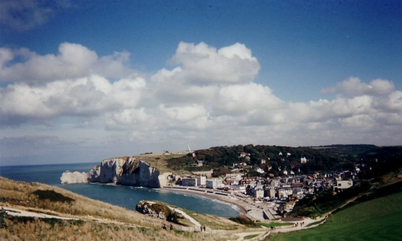 the coast is right next to the shore with buildings on each side