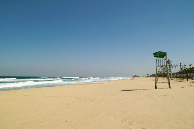 the beach is clean and empty for people