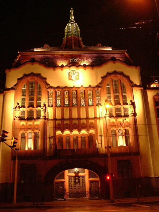 an old brick building lit up at night