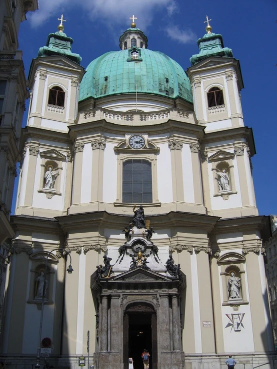 the ornate architecture on the building shows the church's entrance
