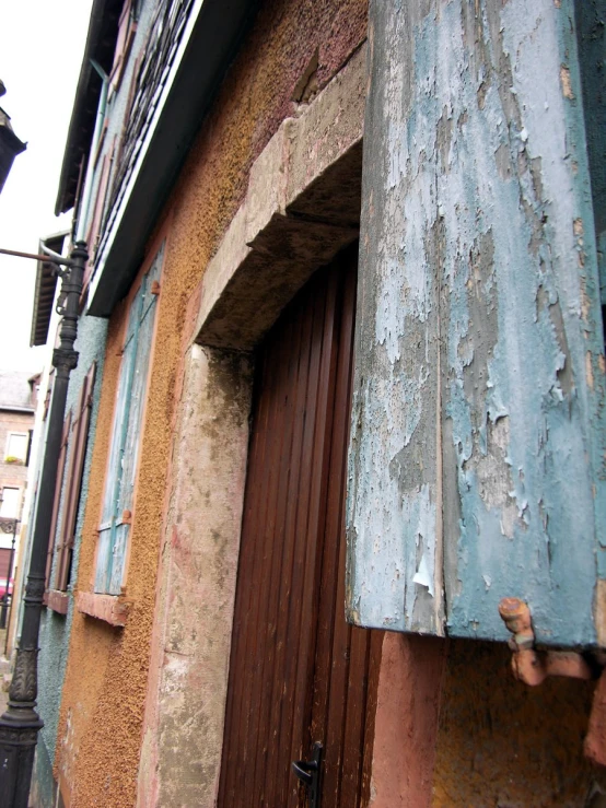 the doors on a building are ed and have a broken handle