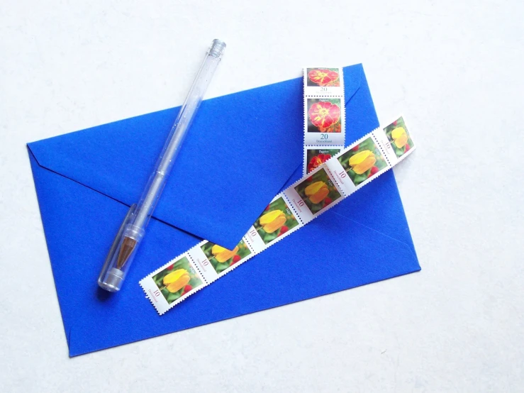 an envelope has stamps with oranges and bananas