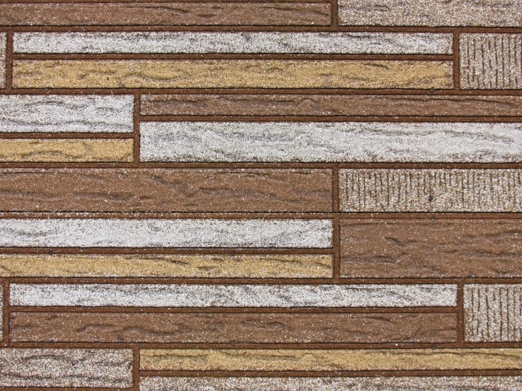 a brown and beige rug on a white table