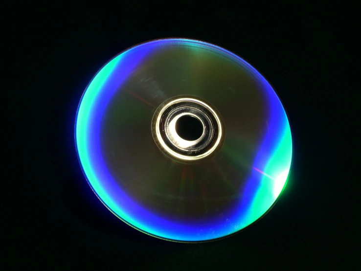 there is a blue cd with the black backround