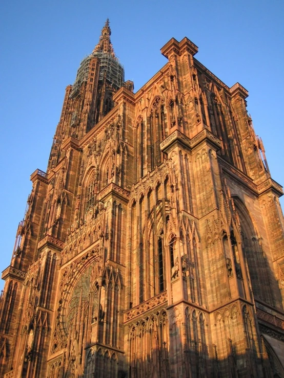 a very large old looking cathedral with a clock