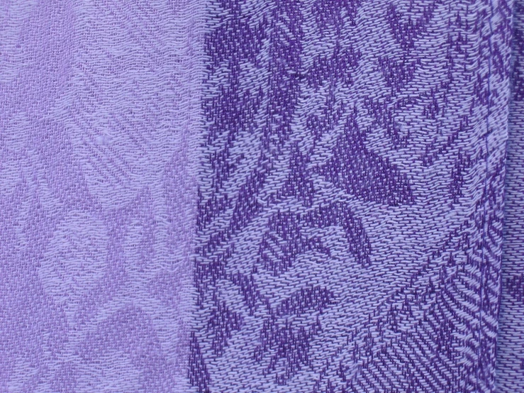 a purple piece of cloth with a paisley design