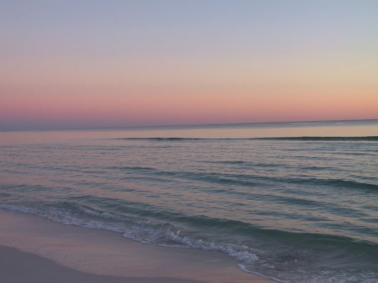 sunset view on the beach from across the ocean