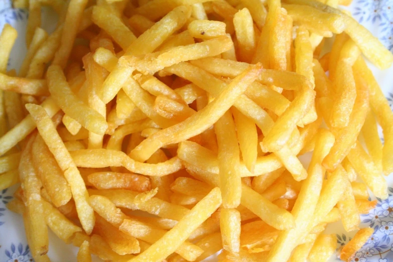 a close - up of food sitting on top of a floral surface