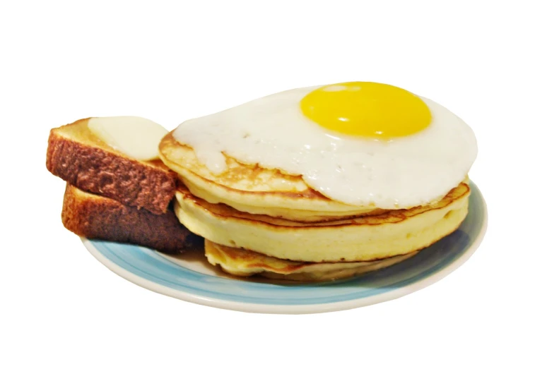 a plate filled with pancakes and a fried egg