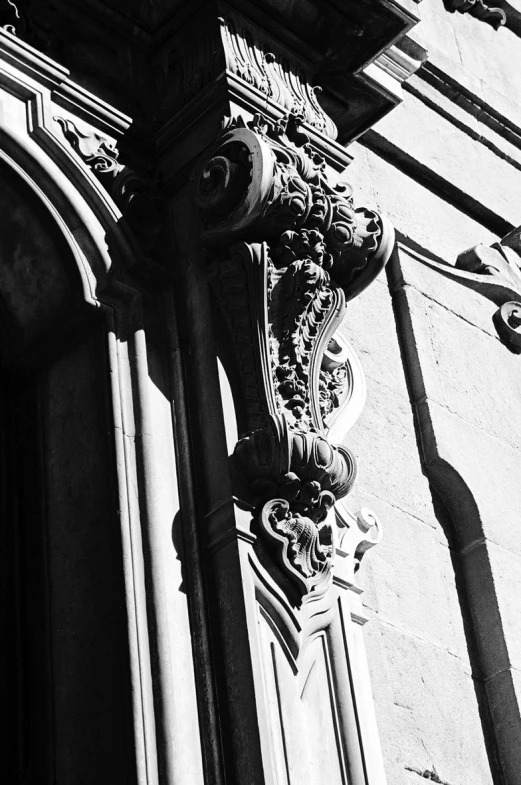 an ornate design is above an entrance door