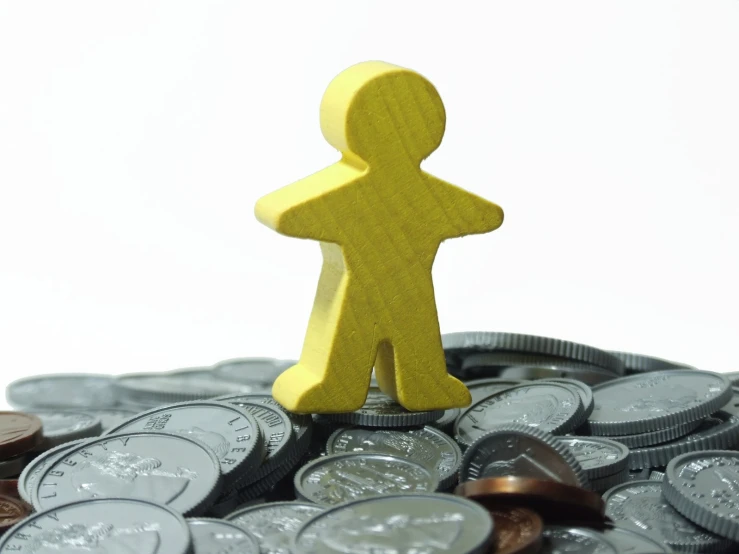 an image of a person standing on top of a pile of coins